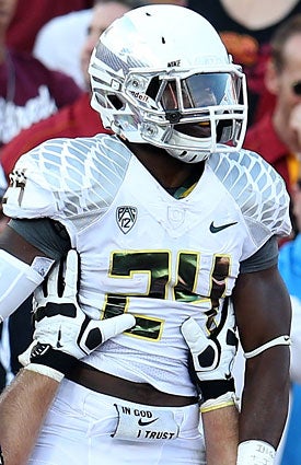 Kenjon Barner is giving Oregon a lift this year, his first as the No. 1 back. (Getty Images)