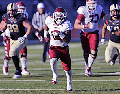 Temple's Montel Harris runs for one of his seven touchdowns against Army. (AP)