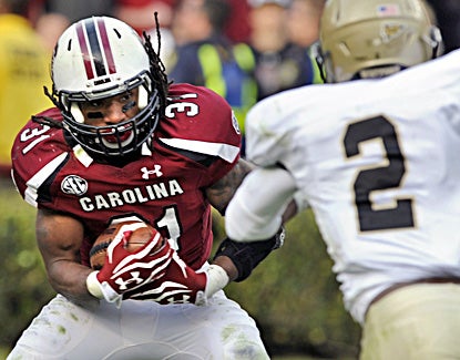 Kenny Miles rushes for a career-high 127 yards and a touchdown in the Gamecocks' win over Wofford. (AP)