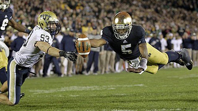 Notre Dame QB Everett Golson dives for a 2-point conversion against Pitt, a display of his athletic ability. (AP)
