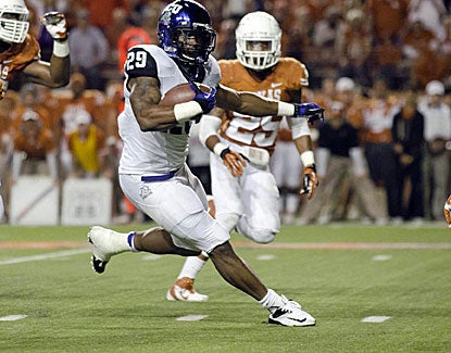 TCU tailback Matthew Tucker runs for two touchdowns in the Horned Frogs upset of No. 18 Texas. (US Presswire)