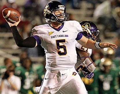 Shane Carden completes 38 of 47 passes for 439 yards and three touchdowns and runs for three more. (US Presswire)