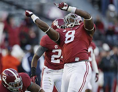 Alabama defensive lineman Jeoffrey Pagan celebrates after making a tackle for a loss vs. Auburn. (US Presswire)