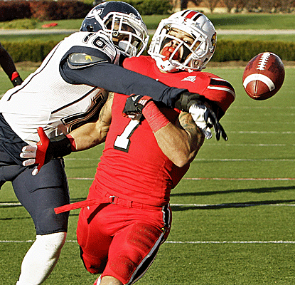 UConn defensive back Byron Jones knocks away a would be touchdown as the Huskies upset Louisville.  (AP)