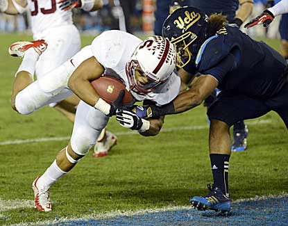 Stanford cornerback Usua Amanam returns a fumble for a score in the Cardinal's win over UCLA. (US Presswire)