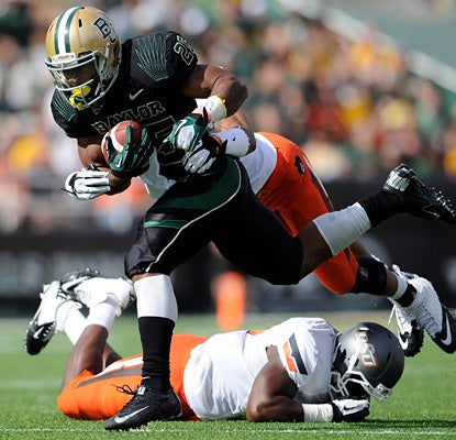 Lache Seastrunk blitzes Oklahoma State for 178 rushing yards, 76 on one TD run in the fourth quarter.  (US Presswire)