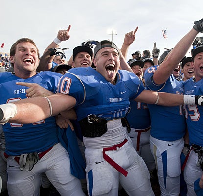 Tulsa celebrates its first Conference USA championship since 2005, clinching a spot in the Liberty Bowl.  (US Presswire)