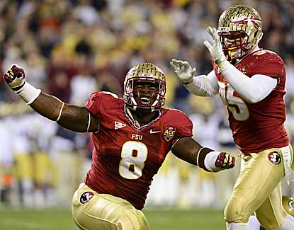 Florida State defensive linemen Timmy Jernigan (8) and Bjoern Werner celebrate a sack on Saturday. (US Presswire)