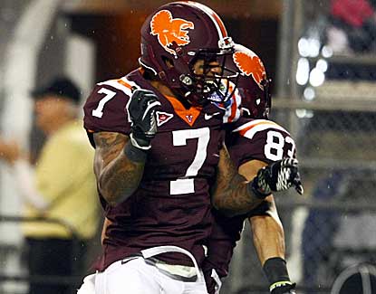 Virginia Tech's Marcus Davis (7) and Corey Fuller celebrate Fuller's game-tying TD against Rutgers. (US Presswire)