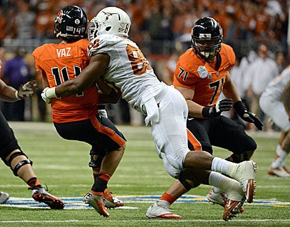 Alex Okafor is a menace for the Longhorns, logging 4 1/2 sacks against Oregon State in the Alamo Bowl. (US Presswire)