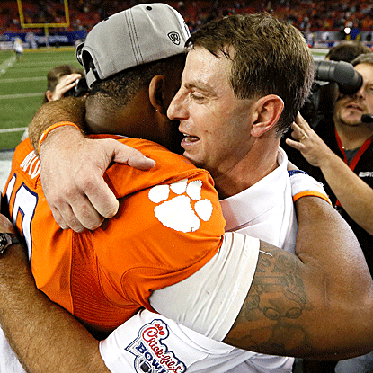 Clemson QB Tajh Boyd celebrates his big Chick-fil-A Bowl win with head coach Dabo Swinney. (US Presswire)