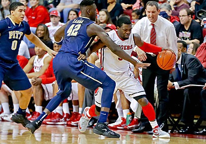 Eli Carter makes a move during the Scarlet Knights' victory over Pitt on Saturday. Carter scored 23 points off the bench.  (US Presswire)