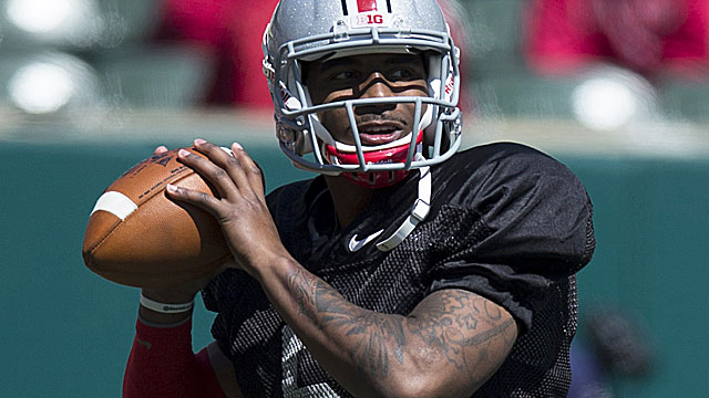 Braxton Miller throws for 2 TDs, and runs for another to lead his side to victory. (USATSI)