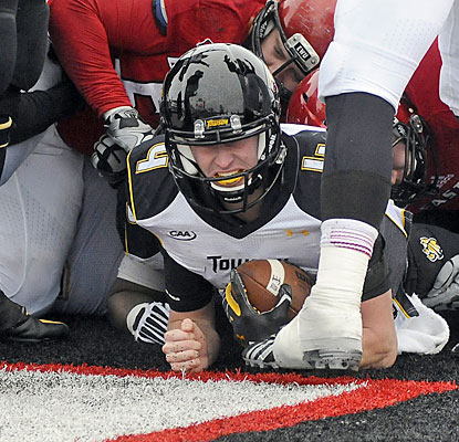 Towson backup QB Connor Frazier squeezes into the end zone for the winning score with 17 seconds left. (USATSI) Towson backup QB Connor Frazier squeezes into the end zone for the winning score with 17 seconds left. (USATSI)