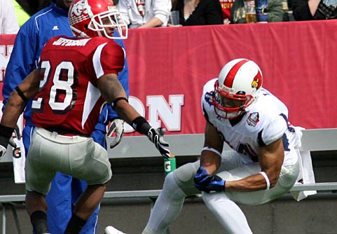 Louisville's Scott Long is unable to make the play for the Nation. 