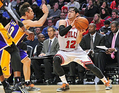 Kirk Hinrich (right) scores 22 points as the Bulls hand the Lakers their ninth loss in 11 games. (US Presswire)