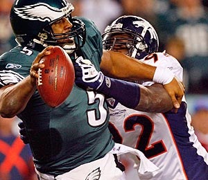 Dumervil was Denver's only major pass-rush threat last year. (Getty Images)