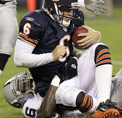 Raiders linebacker Kamerion Wimbley records one of his four sacks on Jay Cutler as the Raiders roll.  (AP)