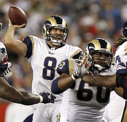 Sam Bradford looks the part in his first start, completing 15 of 22 attempts for 189 yards and two TDs. (AP)