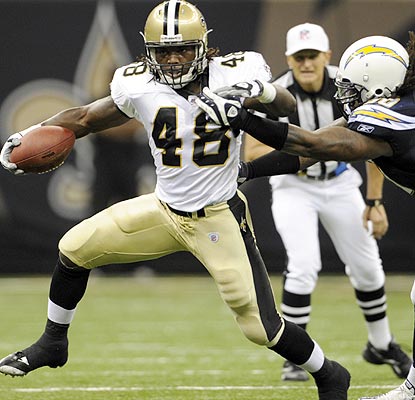 The Chargers have a hard time keeping their hands on Chris Ivory. He scores on an impressive 76-yard run. (US Presswire)