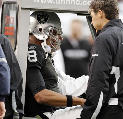 Starting quarterback Jason Campbell exits the game in the second quarter after he suffers a stinger, according to the Raiders.  (AP)