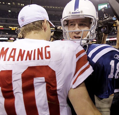 Aside from being brothers, Eli and Peyton have nothing in common when it comes to their stats in the Colts' demoralizing win.  (AP)