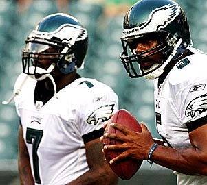Oh, the irony: McNabb helped convince the Eagles to sign Vick. (Getty Images)