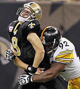 This 'a little late' hit on Drew Brees might earn Harrison another fine. (AP)