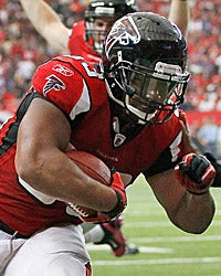 Michael Turner, averaging 4.5 yards per carry, is Atlanta's best hope. (Getty Images)