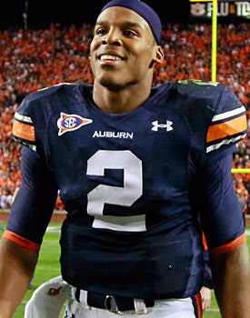 Game-changing QB. Hall of Fame tight end. NFL middleman. Execs can't agree on Newton's pro prospects. (Getty Images)