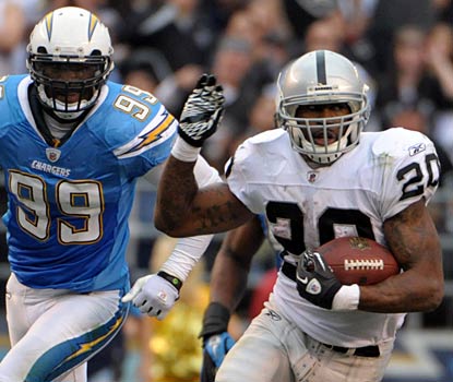 The Chargers can't catch up to Darren McFadden -- who rushes for 97 yards and a touchdown for the resurgent Raiders.   (US Presswire)