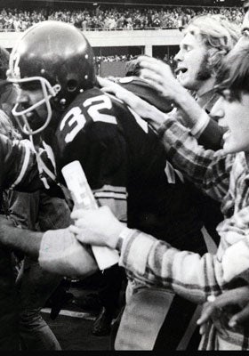 Franco Harris is mobbed after making the 'Immaculate Reception' in 1972. (US Presswire)