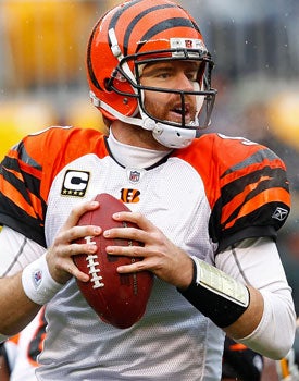 Carson Palmer found a groove last season without Chad Ochocinco and Terrell Owens. (Getty Images)