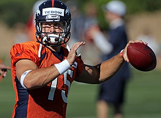 Vying for the starting job in Denver, Tim Tebow is famous for ignoring critics: 'Others who say I won't make it are wrong.' (Getty Images)