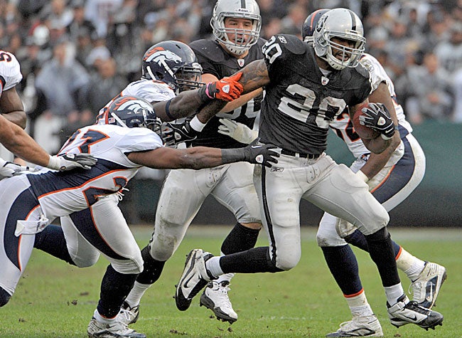 If the Raiders can't open holes for Darren McFadden, Oakland figures to be in trouble. (US Presswire)