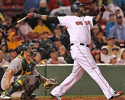 David Ortiz enjoys a banner day against Oakland, going 5 for 8, including this home run in Game 2. (Getty Images)
