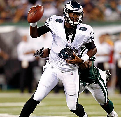 Starting for Michael Vick, backup QB Vince Young leads the Eagles on two scoring drives before his exit. (Getty Images)