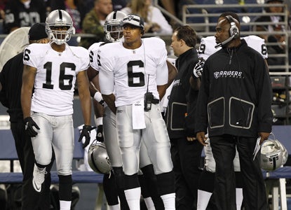 Expected to play, Terrelle Pryor mans the sidelines and tries to learn as much as he can from the beating Seattle throws down. (Getty Images)