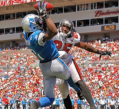Detroit's Calvin Johnson outjumps Aqib Talib of the Buccaneers for one of his two touchdowns in the Lions' victory. (Getty Images)
