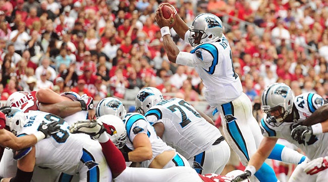 Newton has many impressive plays, including this leaping 1-yard touchdown. (US Presswire)