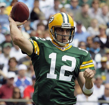 Aaron Rodgers of the Packers throws a pass in the second quarter against the Panthers.  (AP)