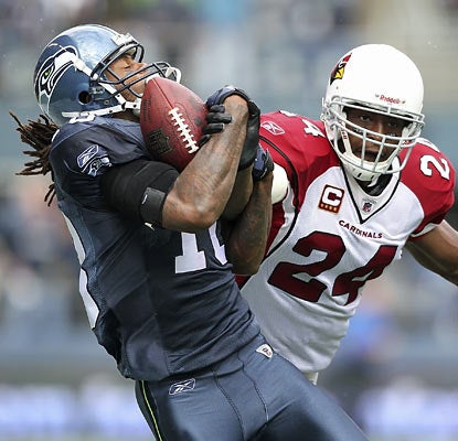 Wideout Sidney Rice, who makes his Seahawks debut, hauls in one of his eight receptions en route to a 109-yard effort. (Getty Images)