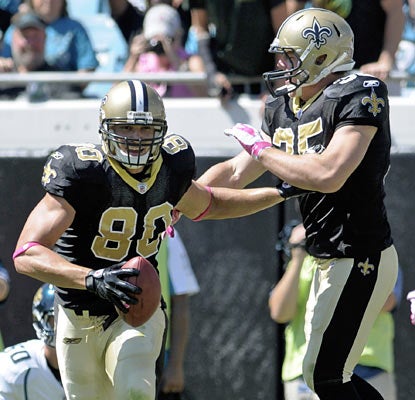 Jimmy Graham is involved early and often as he finishes with career highs in receptions (10) and receiving yards (132).  (AP)