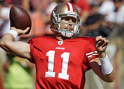 49ers quarterback Alex Smith goes 11 for 19 for 170 yards and three scores in a laugher against the Bucs. (AP)