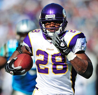 Adrian Peterson (162 yards from scrimmage) runs away from the Carolina defense to score on a 19-yard reception.  (Getty Images)