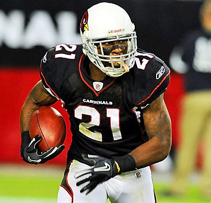 Patrick Peterson runs back a punt for the game-winning touchdown in overtime to beat the Rams. (Getty Images)