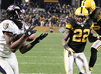 Torrey Smith (82) beats William Gay (22) and Ryan Clark (25) for the game-winning touchdown. (US Presswire)