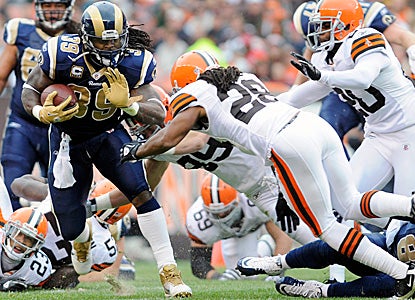 Steven Jackson rushes for 128 yards for the Rams, who eek out their second win thanks to a missed chip shot FG late. (Getty Images)