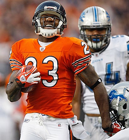 Devin Hester returns another punt to the house to extend his NFL record in a laugher over the Lions. (Getty Images)