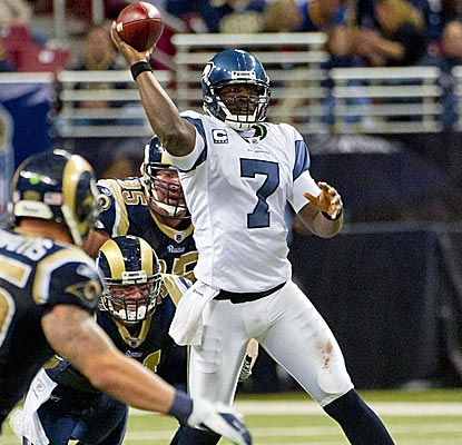 Tarvaris Jackson doesn't get much going in the air against St. Louis but still leads Seattle to a victory. (US Presswire)